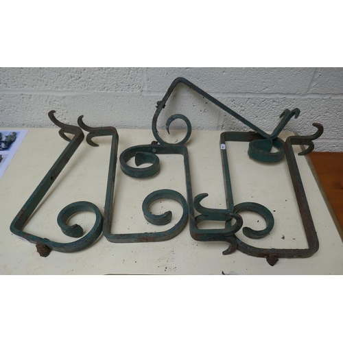 406 - 5 old iron brackets