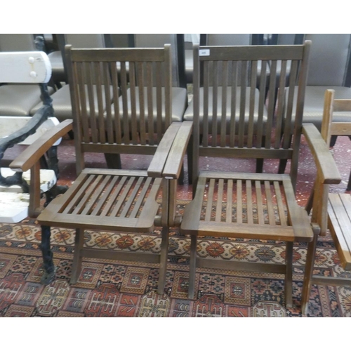 445 - Pair of folding teak chairs