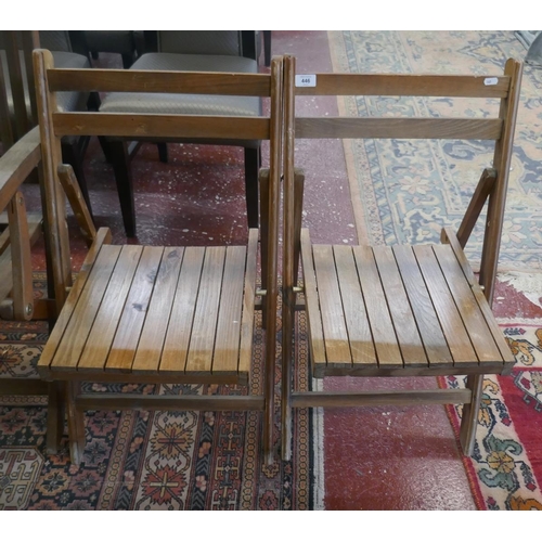 446 - Pair of folding wooden chairs