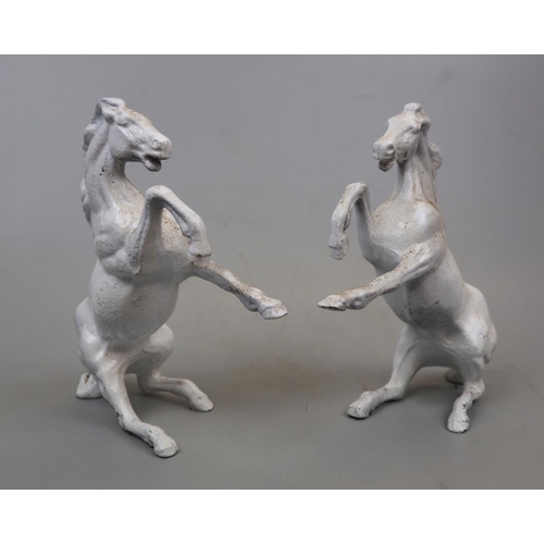 186 - Pair of cast iron rearing horses - Approx height: 21cm