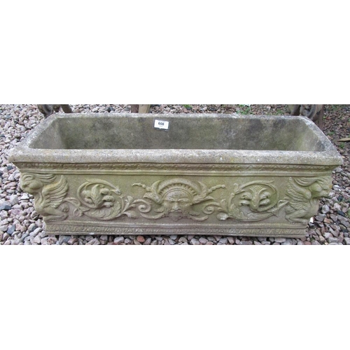 608 - Stone planter adorned with a phoenix - Approx size W: 74cm D: 25cm H: 29cm