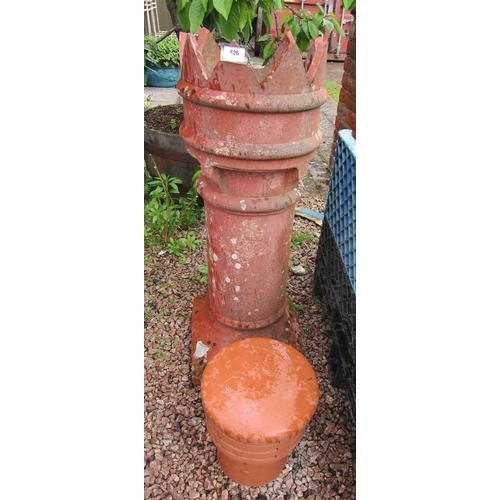 626 - Large chimney pot together with a small chimney pot