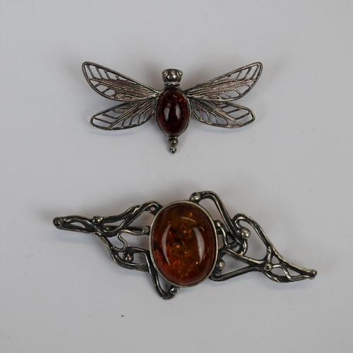 63 - 2 amber set silver brooches