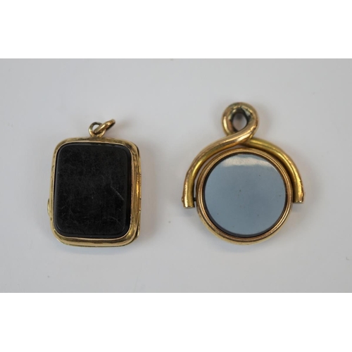 74 - 15ct gold hardstone fob & 18ct gold hardstone locket