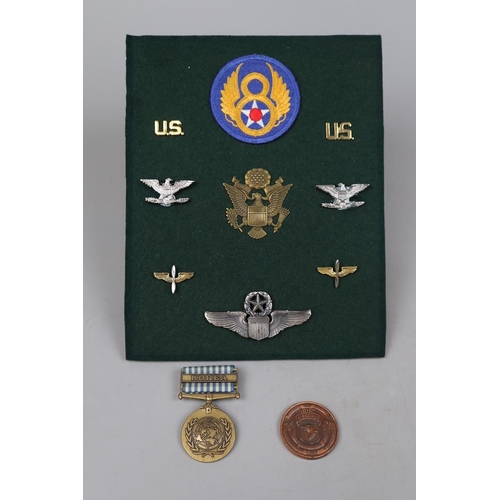 105 - Collection of military medals & badges etc