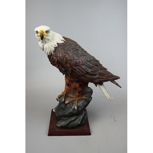 110 - 2 large eagle figures - Approx height of tallest 51cm