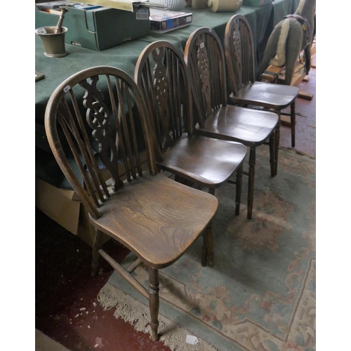 200 - Set of 4 wheelback chairs