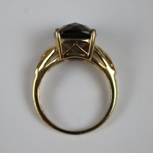 33 - 9ct gold faceted topaz ring - Size L½