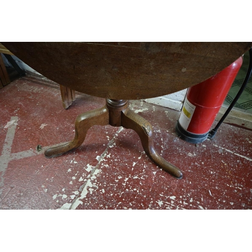 337 - Round oak tilt top tripod table