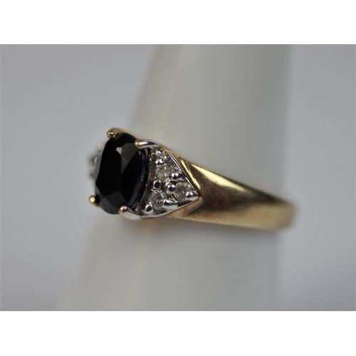 38 - 9ct gold sapphire and diamond set ring - Size L