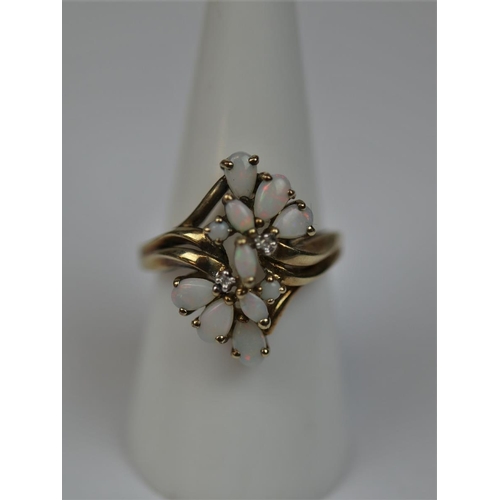 46 - 9ct gold opal & diamond set ring - Size O