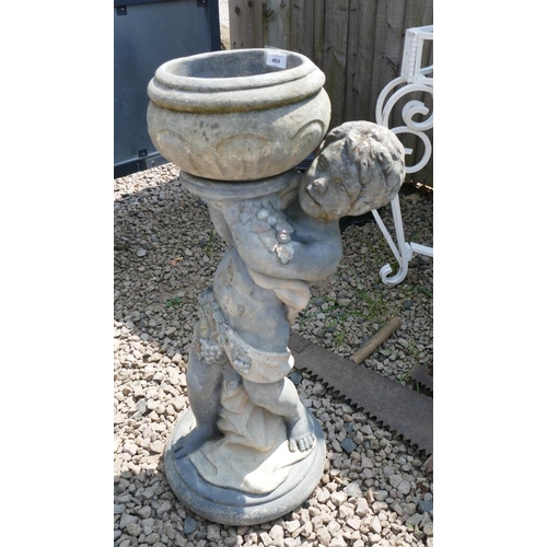 464 - Stone statue of boy holding plant pot - Approx height 75cm