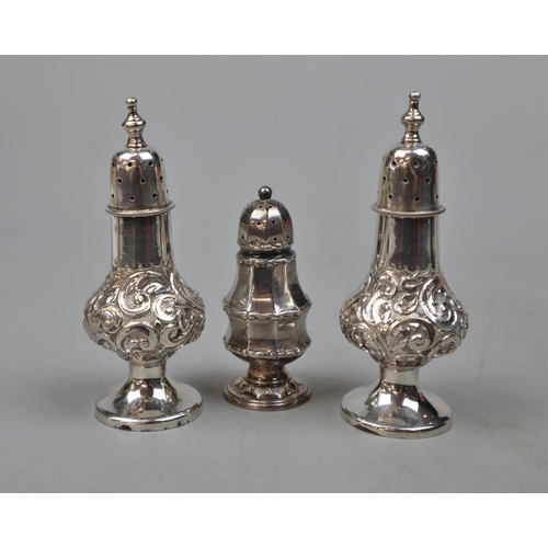 5 - Pair of hallmarked silver shakers together with another - Approx weight 79g