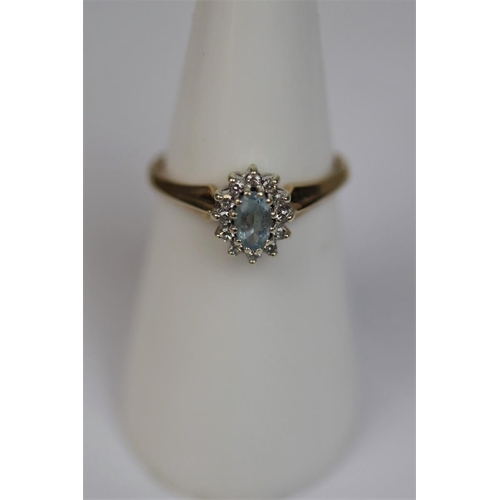 61 - 9ct gold aquamarine & diamond set ring - Size L