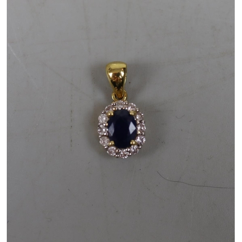 64 - 18ct gold sapphire & diamond set pendant