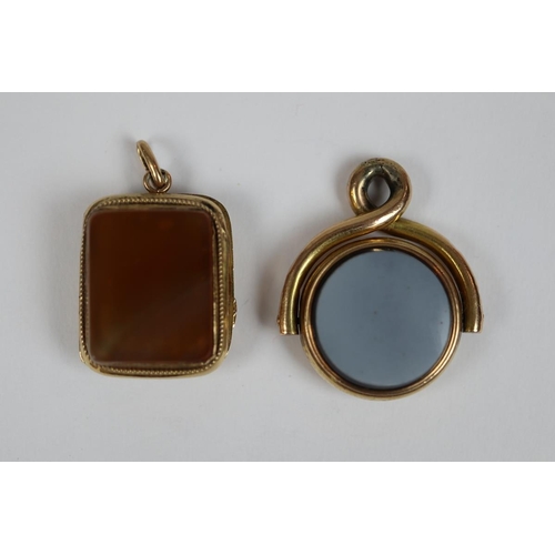 68 - 15ct gold hardstone fob & 18ct gold hardstone locket