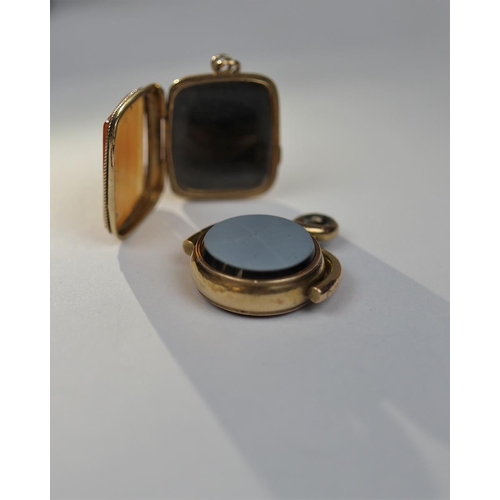 68 - 15ct gold hardstone fob & 18ct gold hardstone locket