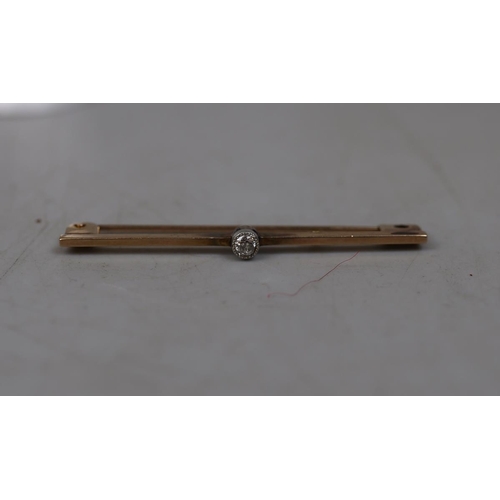 69 - 9ct gold diamond set bar brooch