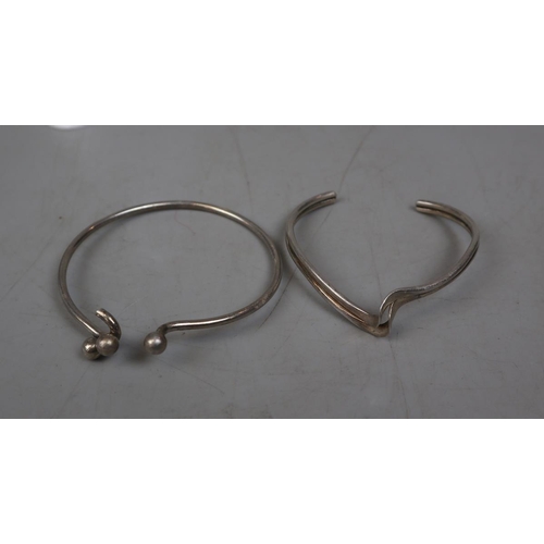 72 - 2 silver bangles