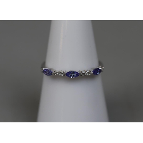 87 - 9ct white gold tanzanite & diamond set ring - Size N