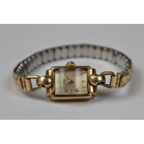 99 - 9ct gold cased watch