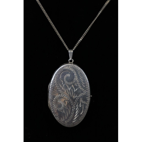 116 - Large silver locket and chain