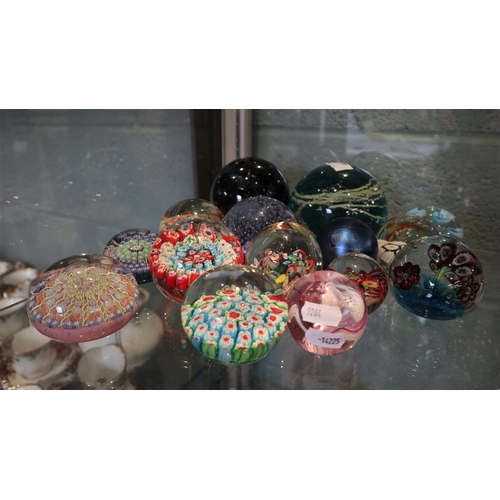 199 - Collection of glass paperweights to include Caithness