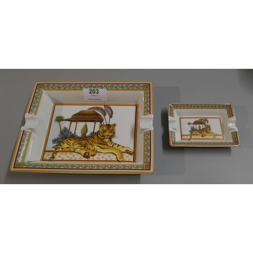 203 - 2 mid C20th Italian ashtrays with tiger decoration. The larger approx 19cm x 15.5cm. The smaller app... 