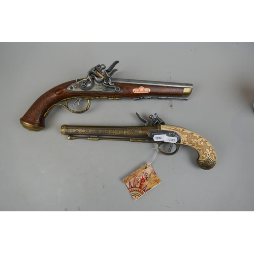 233 - 2 reproduction flintlock pistols