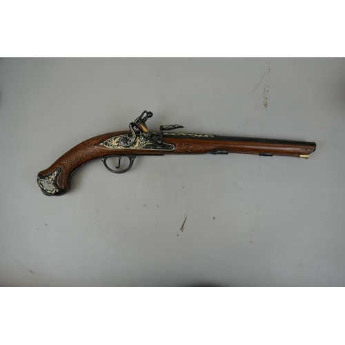 234 - Reproduction flintlock pistol