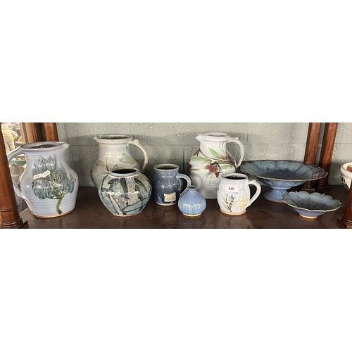 249 - Collection of decorative stoneware to include Simon and Benjamin Eels