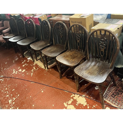 276 - 8 wheelback chairs