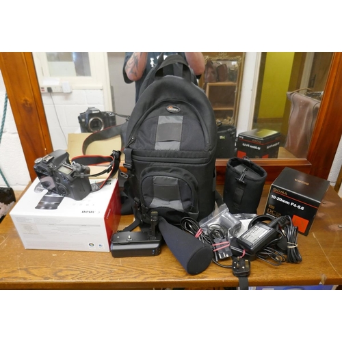 387 - Canon EOS50D camera boxed with wide angle lens and accessories