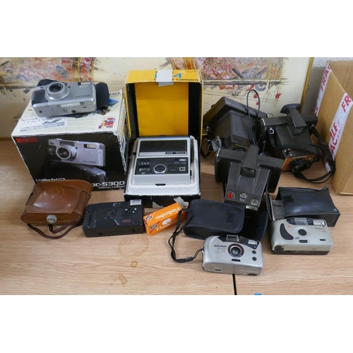 394 - Kodak Instamatic digital camera together with others