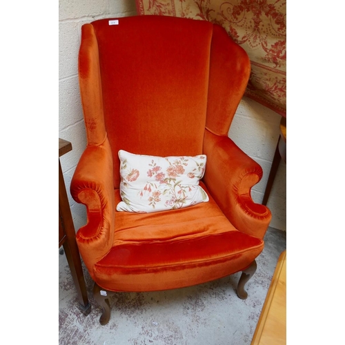 474 - Vintage Christie Tyler orange fabric Queen Anne style wing chair (labelled underneath)