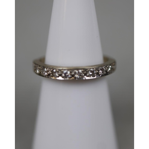 64 - 18ct white gold diamond ½ hoop ring - Size M