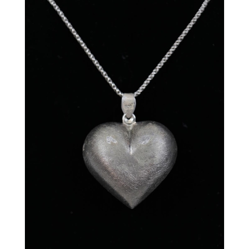 77 - Large silver heart pendent on chain