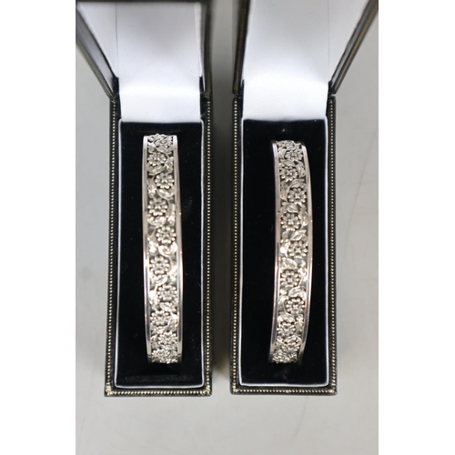 102 - Pair of silver bangles