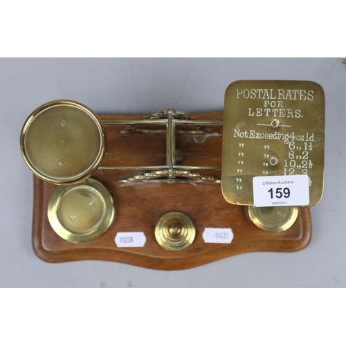 159 - Set of brass postage scales