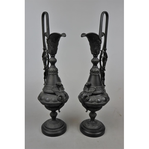 190 - Pair of metal candlesticks in form of claret jugs - Approx height: 43cm