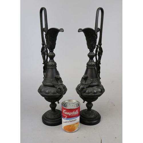 190 - Pair of metal candlesticks in form of claret jugs - Approx height: 43cm