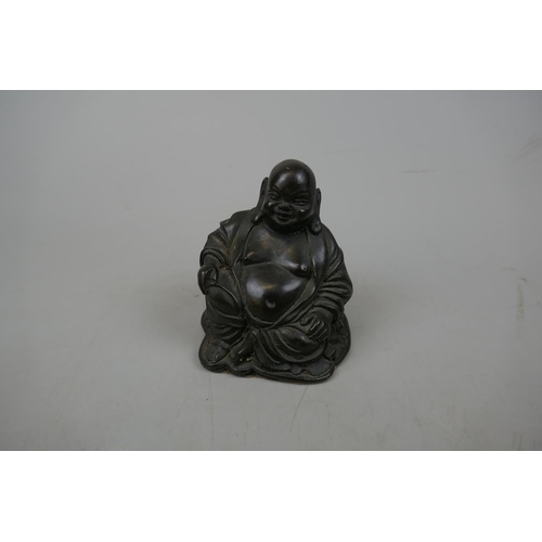 219 - Antique bronze dog together with bronzed Buddha