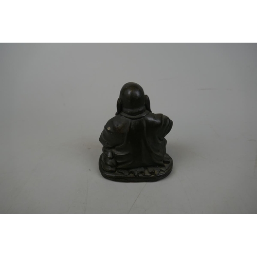 219 - Antique bronze dog together with bronzed Buddha