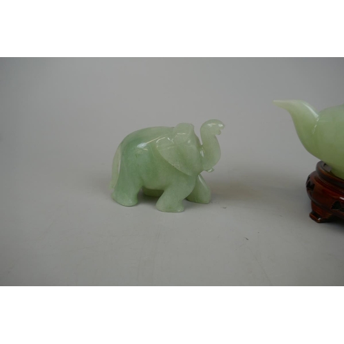 222 - Selection of jade ornaments to include teapot, elephant and Buddha