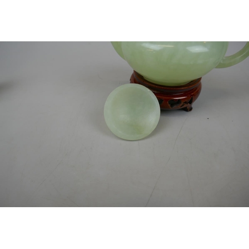 222 - Selection of jade ornaments to include teapot, elephant and Buddha