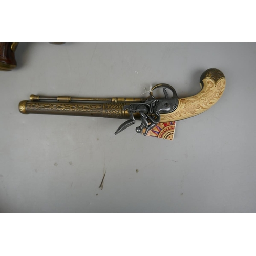 233 - 2 reproduction flintlock pistols