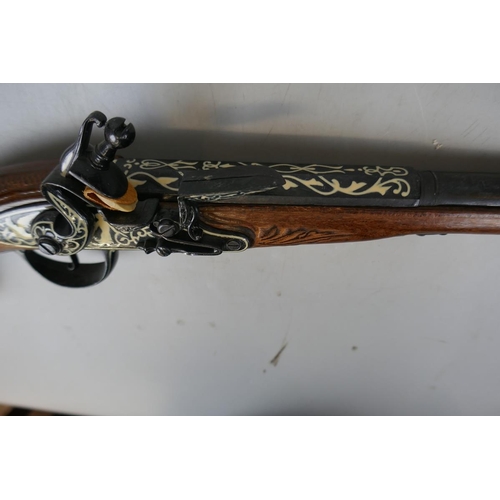 234 - Reproduction flintlock pistol