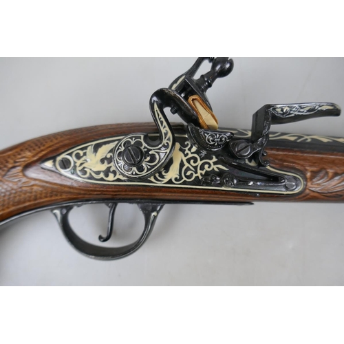 234 - Reproduction flintlock pistol