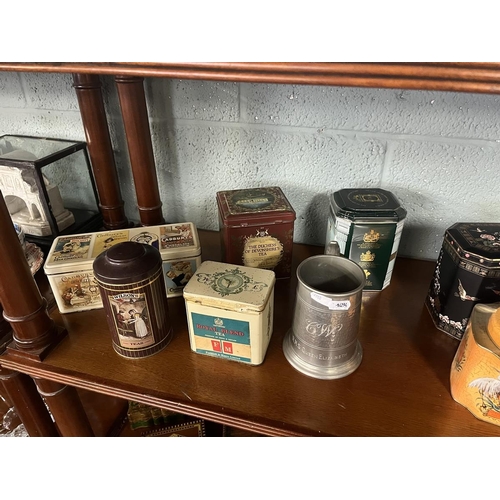 264 - Collectables to include tea caddy tins and pewter