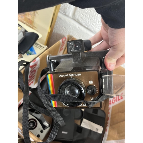 394 - Kodak Instamatic digital camera together with others